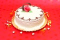 White cake on red background Royalty Free Stock Photo