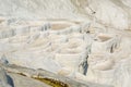 White calcium mountain with granite with small waterfall in summer in Pamukkale Royalty Free Stock Photo