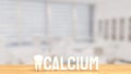 The white calcium text and teeth on wood table 3d rendering Royalty Free Stock Photo