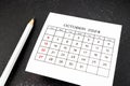 White calendar page for October 2024 and pencil Royalty Free Stock Photo