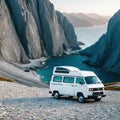 A white camper van is parked on rocky ground in front of in the style of