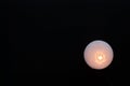 White candle on a black background, Royalty Free Stock Photo