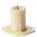 Flickering white candle melting gently on a clean surface with warm light Royalty Free Stock Photo