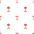 White candle with pink bow in candlestick pattern seamless vector