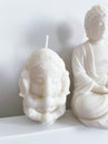 Soy wax Buddha and Ganesha Royalty Free Stock Photo