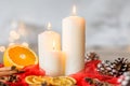White candles and orange Royalty Free Stock Photo