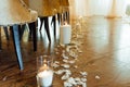 White candles in vase on the floor for ceremony Royalty Free Stock Photo