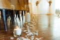 White candles in vase on the floor for ceremony Royalty Free Stock Photo