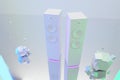 White candy-neon audio loudspeakers standing on white background with pastel colors