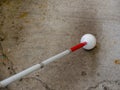 White cane travel with a roller ball tip
