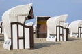 White canopied beach chairs at Baltic Sea