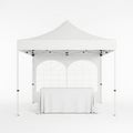 White canopy tent with display table setup on white background Royalty Free Stock Photo