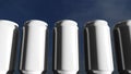 White cans against sky at sunset. Soft drinks or beer for party. Beach bar. 3D rendering Royalty Free Stock Photo