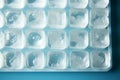 White canvas adorned with a close up of numerous ice cubes