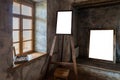 White canvas on picture frames on wooden easel and leaning against the wall