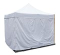 White canvas tent for small shop installed on the street isolated