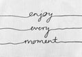 White canvas texture with text enjoy every moment life quotes Royalty Free Stock Photo