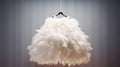 White cape bolero on the shoulders of white feathers. Feather wedding bolero. Wedding jacket.