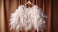 White cape bolero on the shoulders of white feathers. Feather wedding bolero. Wedding jacket.