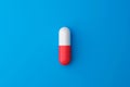 White capsule or painkillers with a pharmacy on a medical background. White pills for alleviating illness or fever. 3D rendering