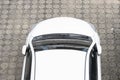 White car aerial view of parking lane Royalty Free Stock Photo