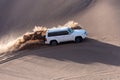 White car in dasht e lut or sahara desert Royalty Free Stock Photo