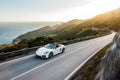 White Car In Mountain Road With Speed Blur Royalty Free Stock Photo