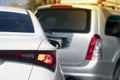 White car open turn signal for U-Turn. Royalty Free Stock Photo