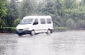 White car in the rain Royalty Free Stock Photo