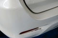 White car rear bumper cracks