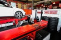 White car in a workshop of the Tyre repair and wheel alignment Centre of Johannesburg, South Africa