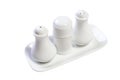 White caramic saltshaker and pepper container Royalty Free Stock Photo
