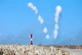 White carbon fiber clouds in blue sky hiding naval destroyers from anti-ship missiles, military show Royalty Free Stock Photo