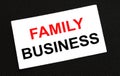 White card on the black background with text Family Business