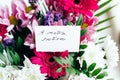 card for a bouquet with the inscription I love you in Russian in a bright beautiful bouquet of flowers Royalty Free Stock Photo