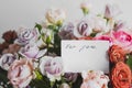 card for a bouquet with the inscription for you in a bright beautiful bouquet of flowers roses Royalty Free Stock Photo