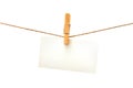 White card with clothes peg isolated
