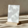 White Card Holder on Wooden Table Royalty Free Stock Photo