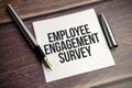 white card with text Employee Engagement Survey Royalty Free Stock Photo