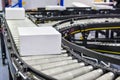 White cardboard boxes on conveyor belt industrial Royalty Free Stock Photo