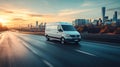 White cargo van driving on highway at sunset with city skyline in background Royalty Free Stock Photo