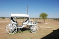 White carriage in a field Royalty Free Stock Photo