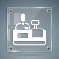 White Cashier at cash register supermarket icon isolated on grey background. Shop assistant, cashier standing at Royalty Free Stock Photo