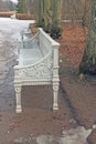 White cast-iron bench in the park Royalty Free Stock Photo