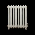A white cast iron radiator on a black background Royalty Free Stock Photo