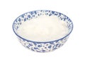 White caster sugar in a blue and white china bowl