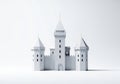 White castle model with pointed turrets and a central tower, featuring battlements and Royalty Free Stock Photo
