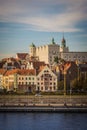 White castle with towers and green roofs and red roofs of residential and office houses and river in Szczecin, Poland Royalty Free Stock Photo