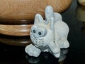 White cat chasing mice. Clay figure made by hand. Royalty Free Stock Photo