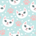 White cats heads light blue cute seamless pattern with hearts and paws. .